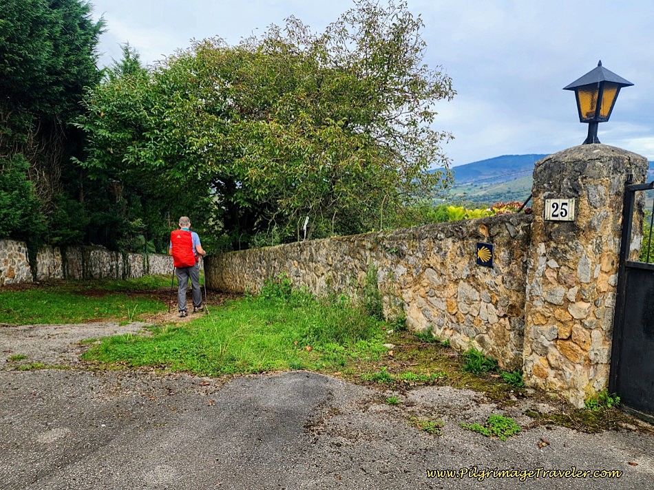 Left Turn Where Pavement Ends at Stone Wall