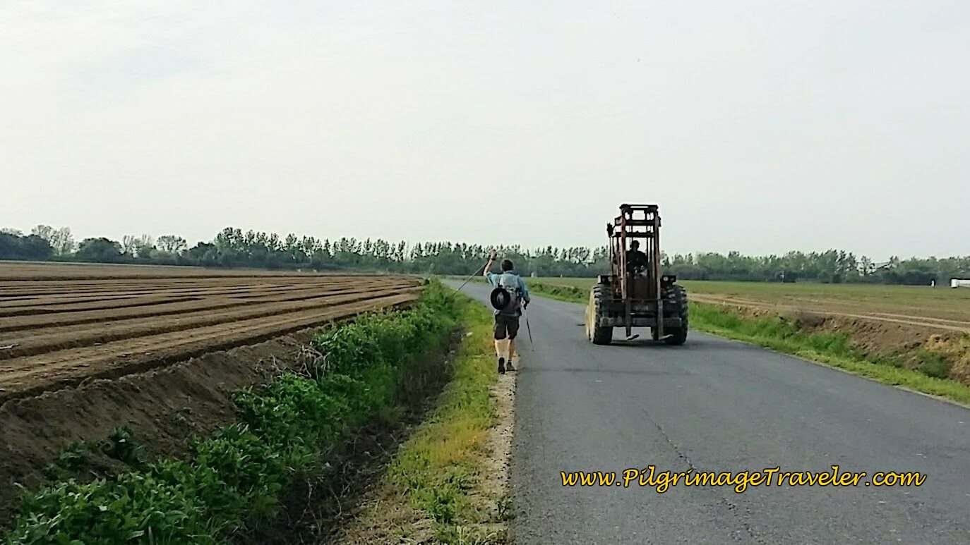 Rich Waves to a Farmer as He Passes