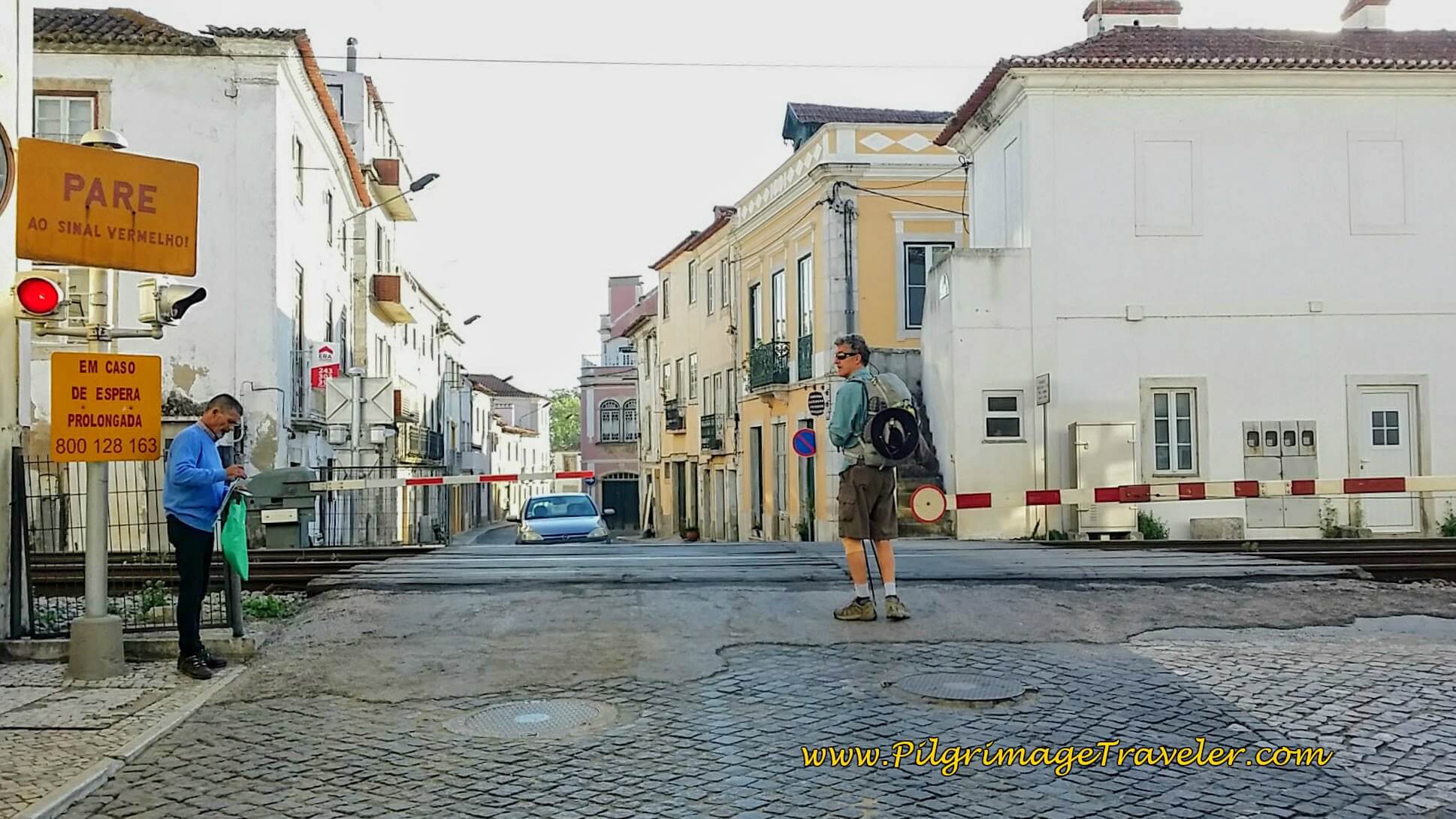Cross the Train Tracks on the Rua Alfageme de Santarém