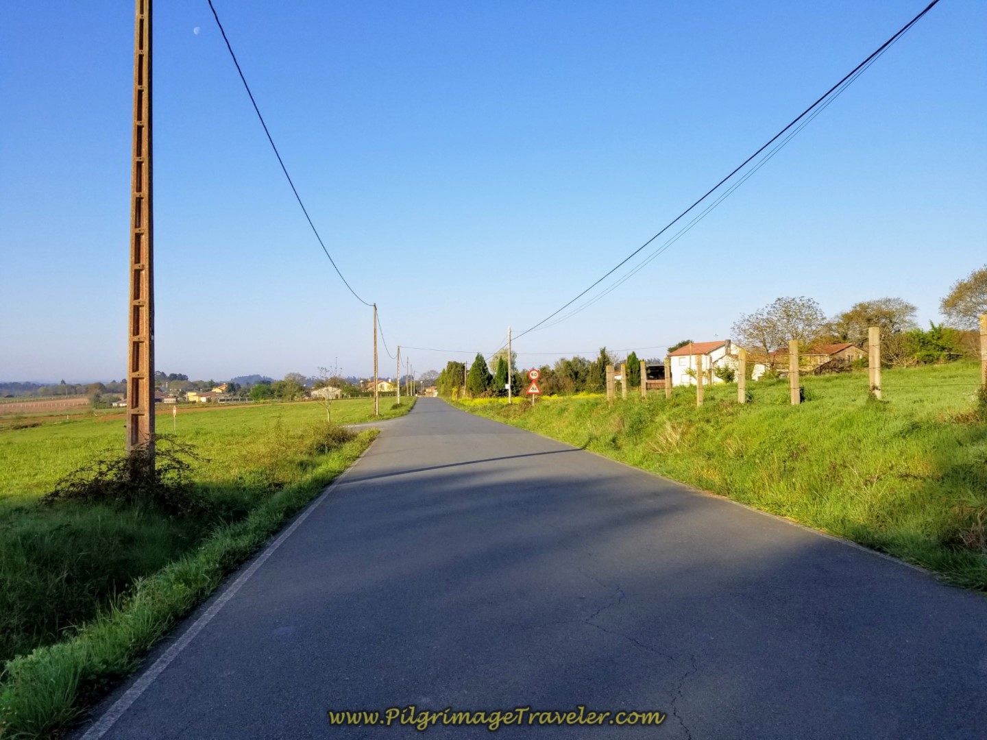 Long Paved Road Towards A Rúa on day seven of the Camino Inglés