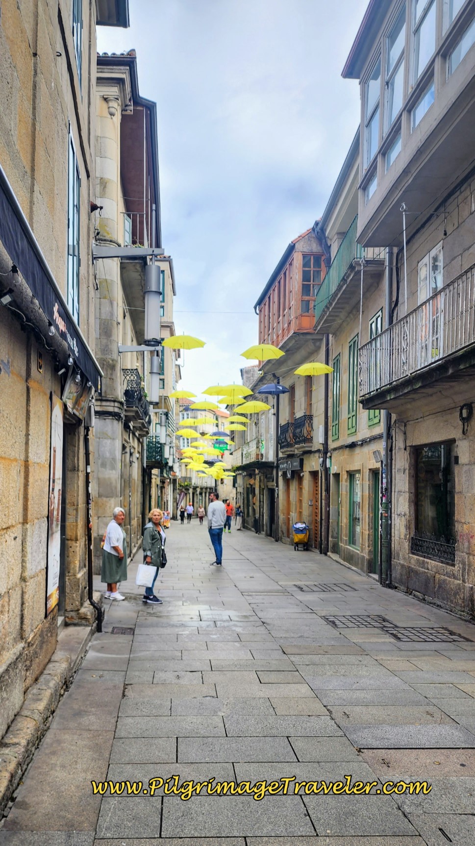 Yellow Umbrellas on the Continuing Rúa Real, Pontevedra Yellow Umbrellas on the Continuing Rúa Real