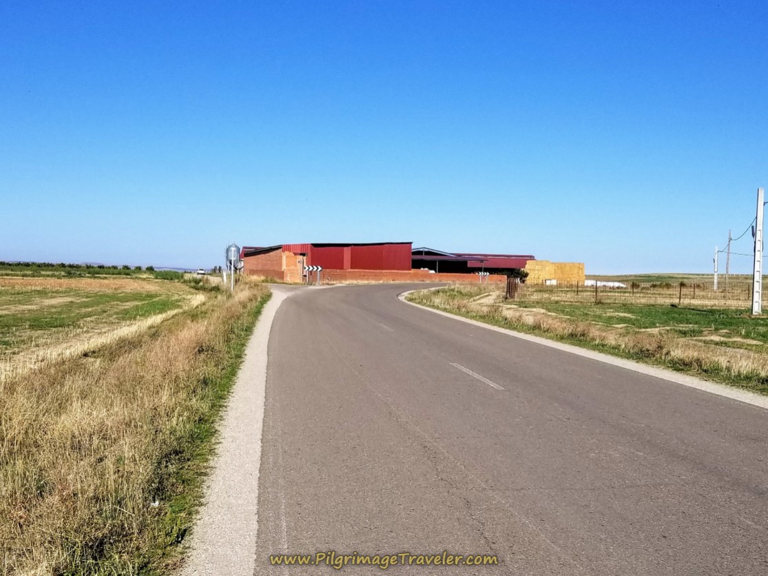 Turn Left Onto the Camino de Fresnillo a Macotera at this Farm on day five of the Camino Teresiano.