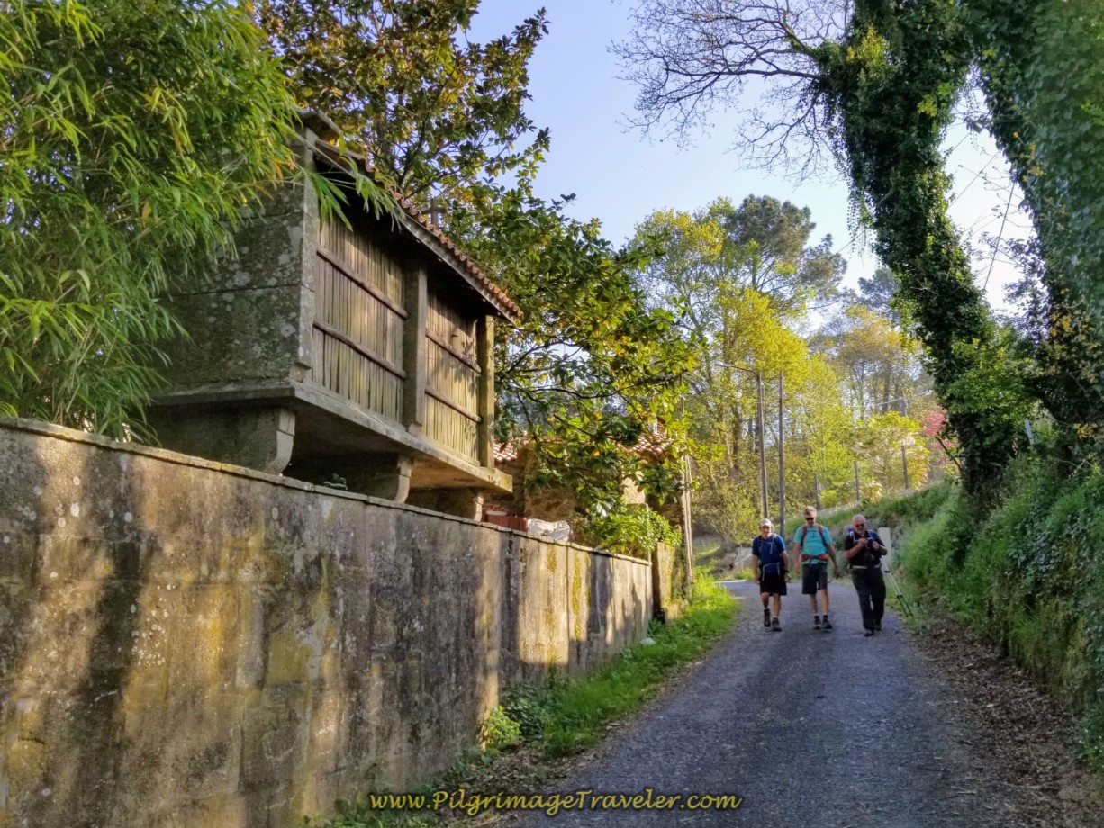 The gentlemen pass an horreo on the Sionlla Abaixo on day eight of the Camino Inglés