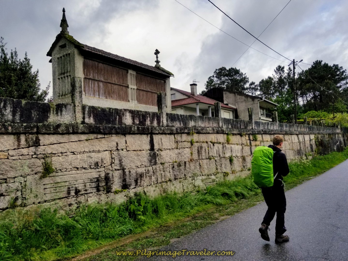 Magnus Walks by a Galician Horreo on day twenty-one of the central route of the Portuguese Camino