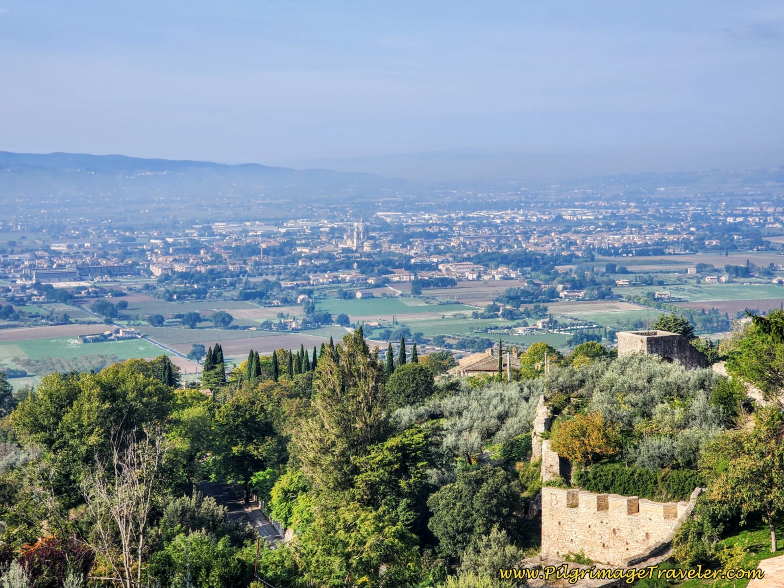 View of the Plain Below from the Piazza Santa Chiara, Assisi, Italy, A sacred medieval treasure