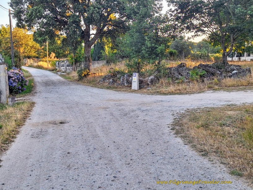 100.111 Kilometer Waymark at Intersection