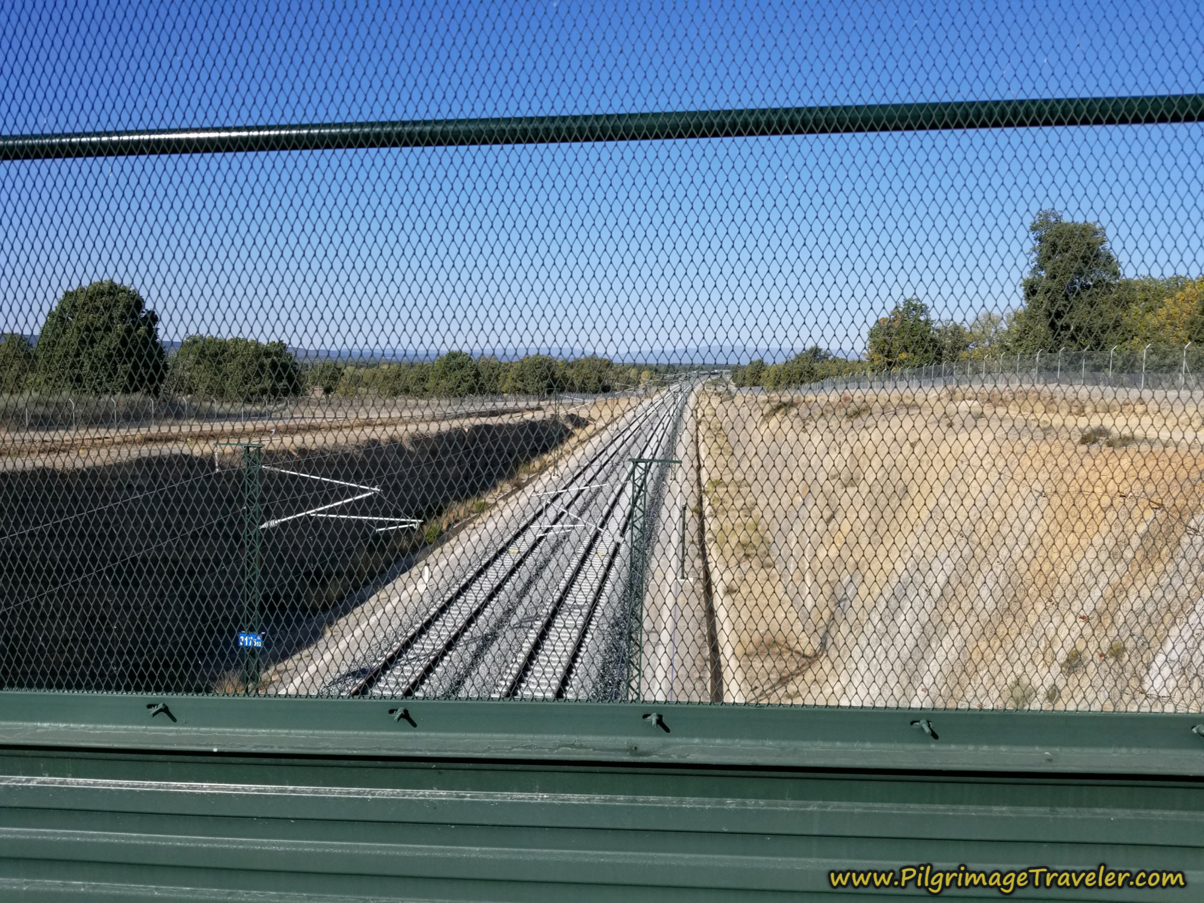 Cross Railroad Tracks on a Bridge on the Camino Sanabrés from Rionegro del Puente to Entrepeñas Cross Railroad Tracks on a Bridge on the Camino Sanabrés from Rionegro del Puente to Entrepeñas