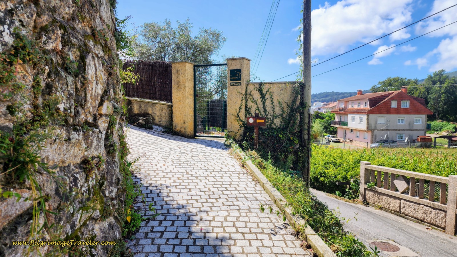 Left Up the Hill on Cobblestone Walkway