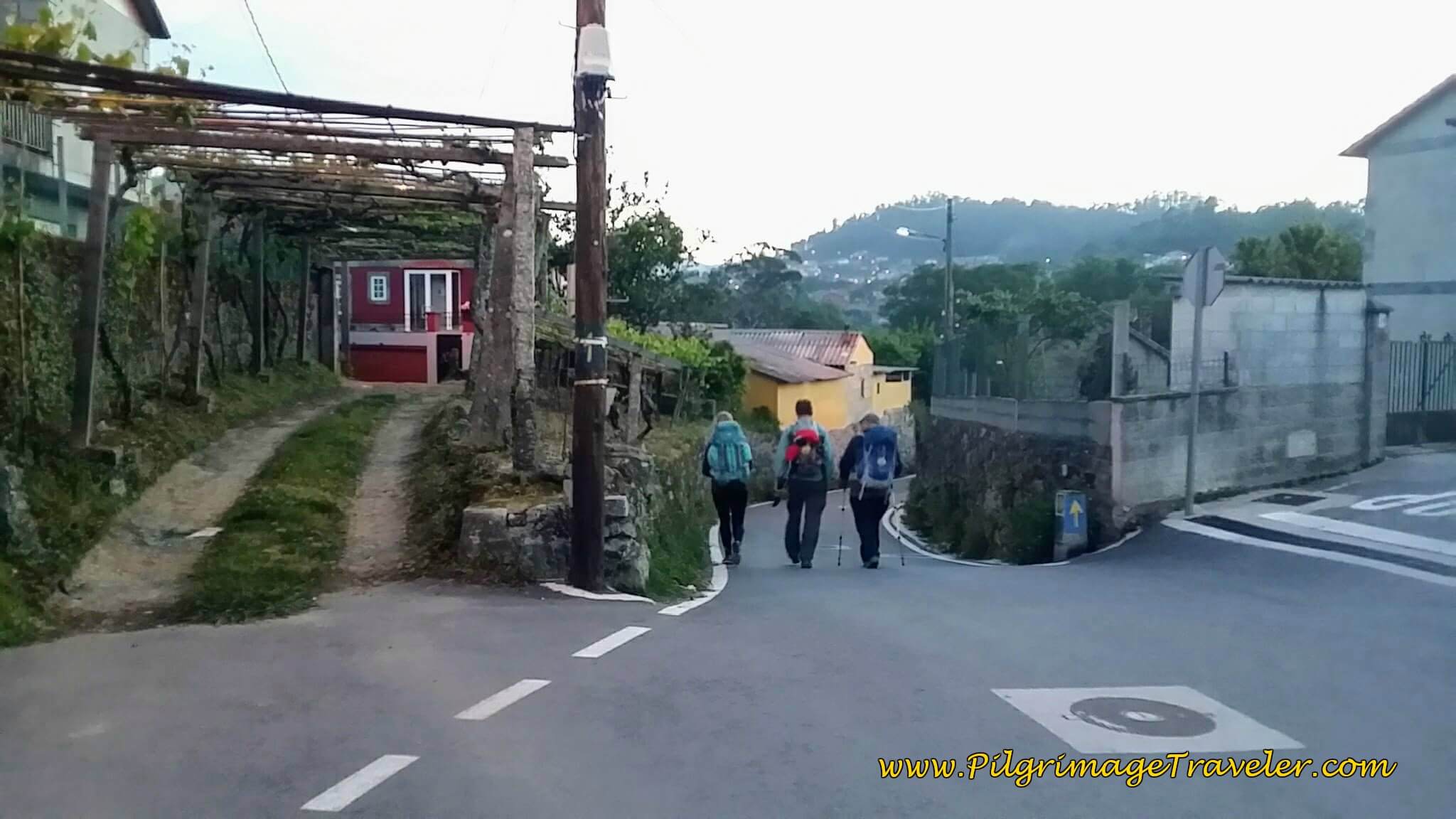 Here is a quaint arbor over a driveway to a home along the Rúa da Gándara on day twenty-three, Camino Portugués