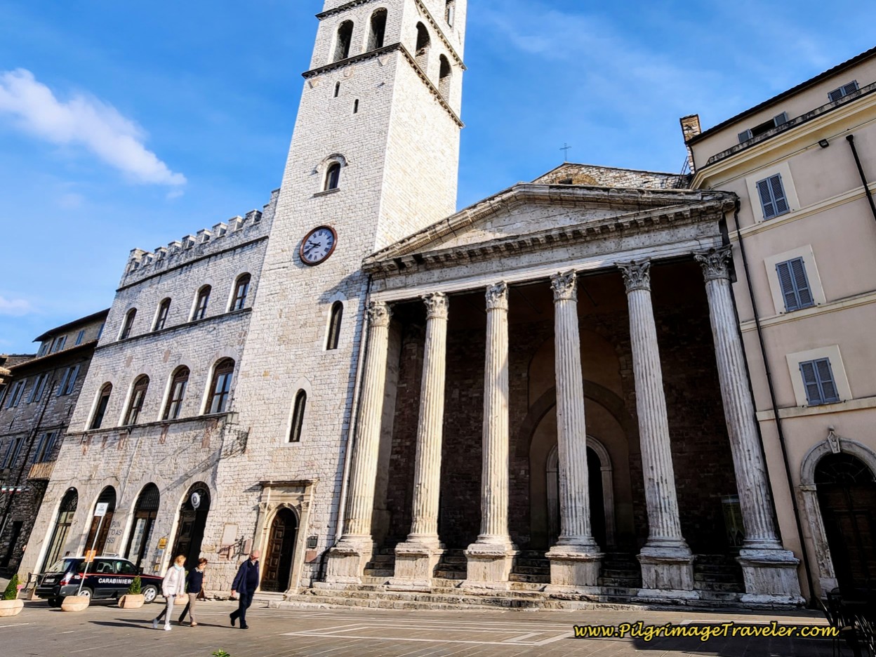 Way of St. Francis: Day Eleven, Assisi to Spello, walking past the Chiesa di Santa Maria Sopra Minerva in the Piazza del Comunue, Assisi.