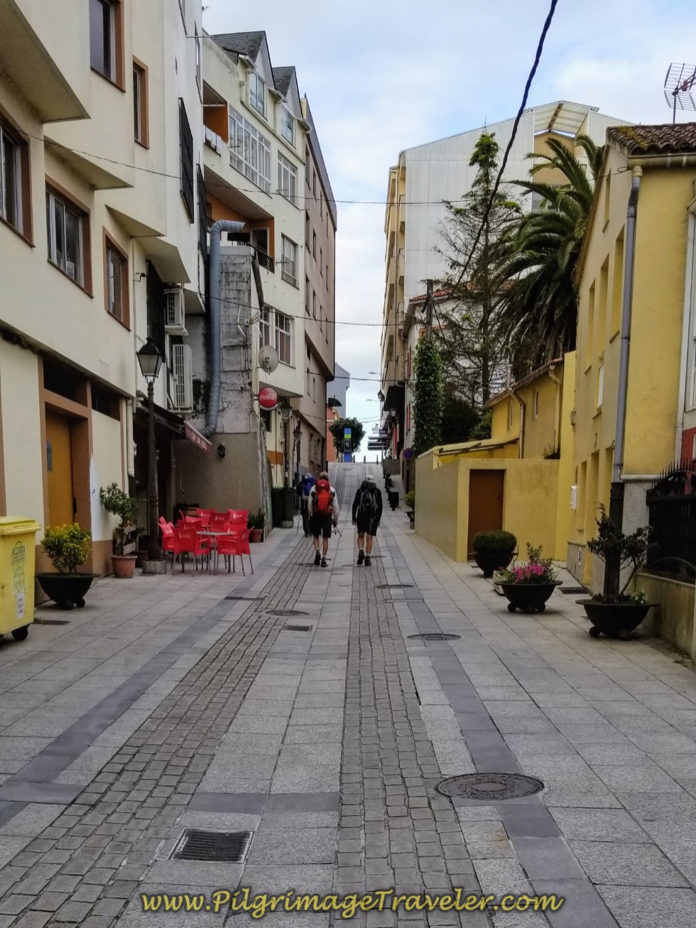 Continue on the Rúa Real in Miño on day four of the Camino Inglés