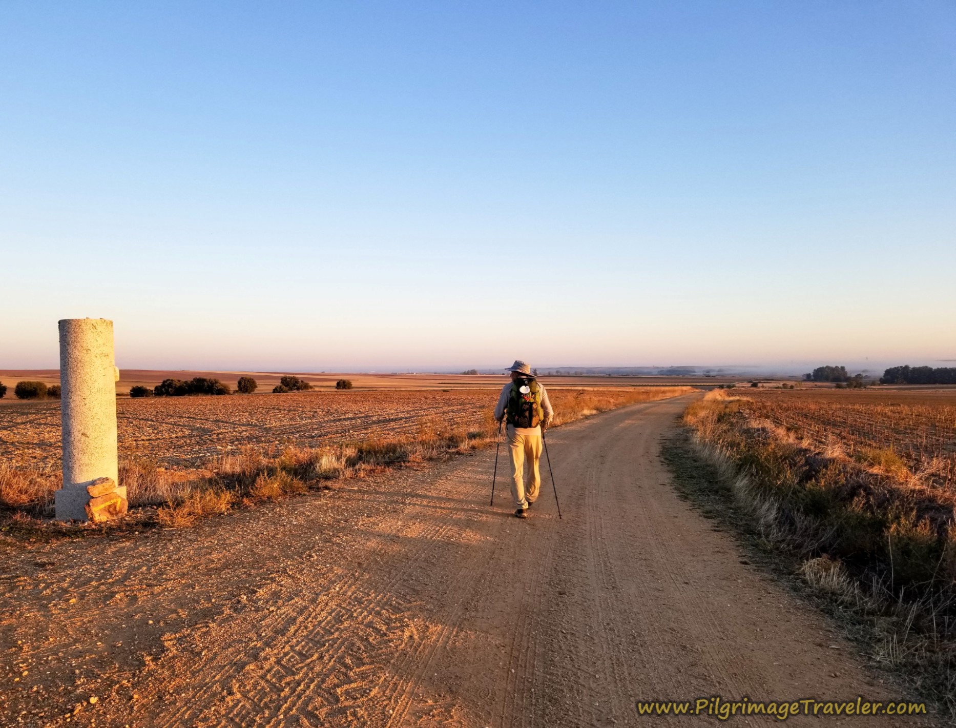 Norm walks by the next pillar on the Vía de la Plata from Villanueva de Campeán to Zamora