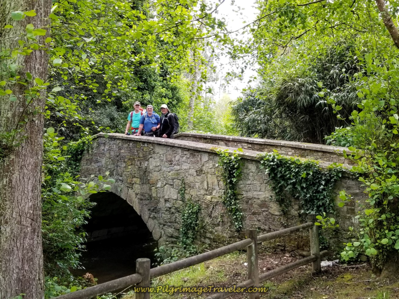 Rich, Steve and Rob on the Puente Medieval de Baxoi on day three of the Camino Inglés
