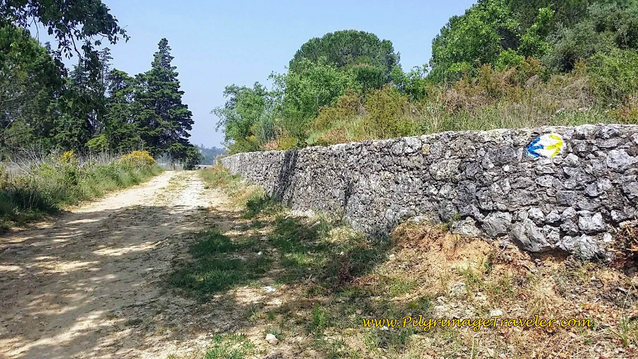 Yellow and Blue Arrows on the Aqueduct Wall, Tomar Portugal