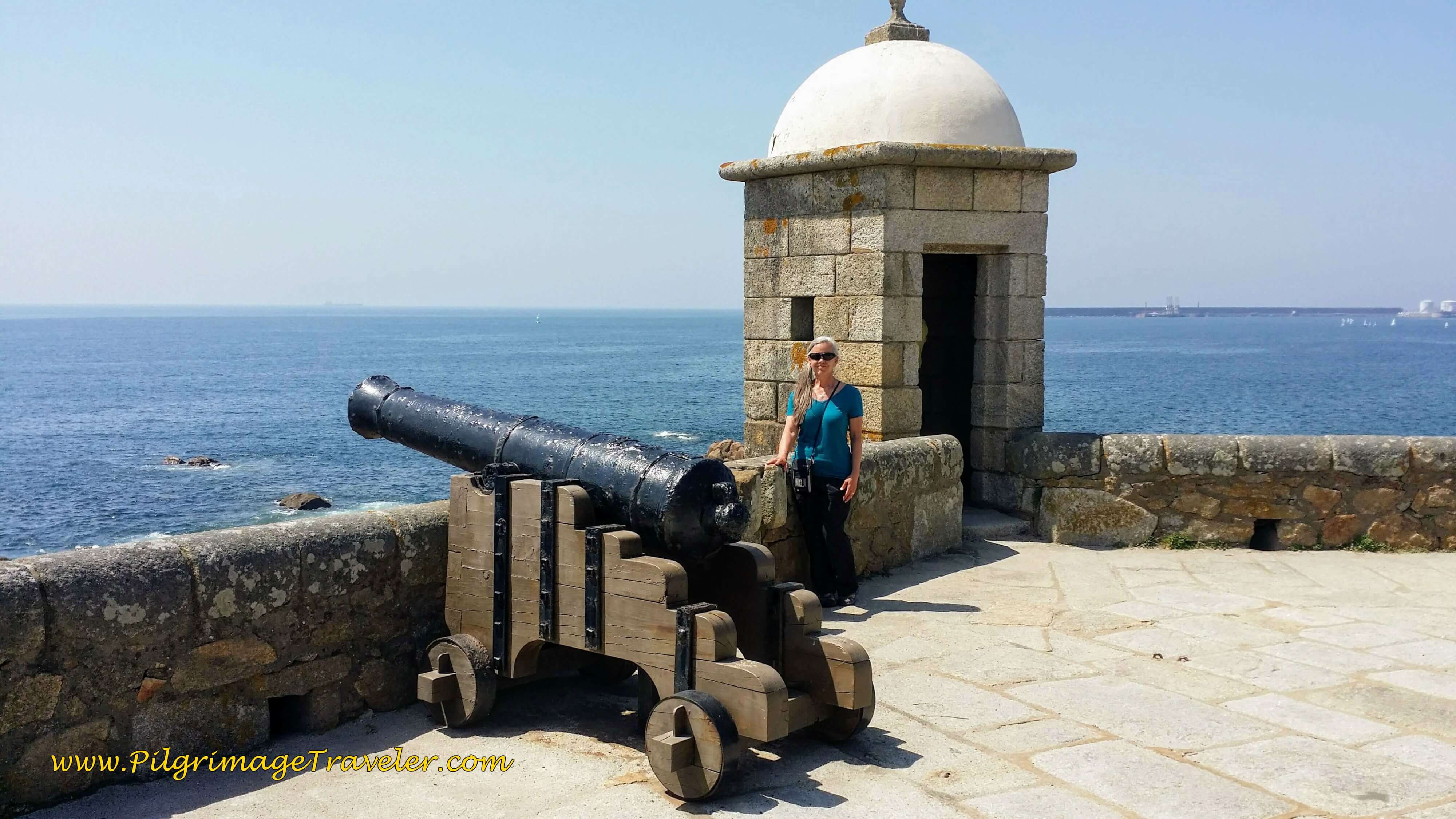 Elle with a Cannon by a Sentry Tower of the Castelo do Queijo in Porto, Portugal