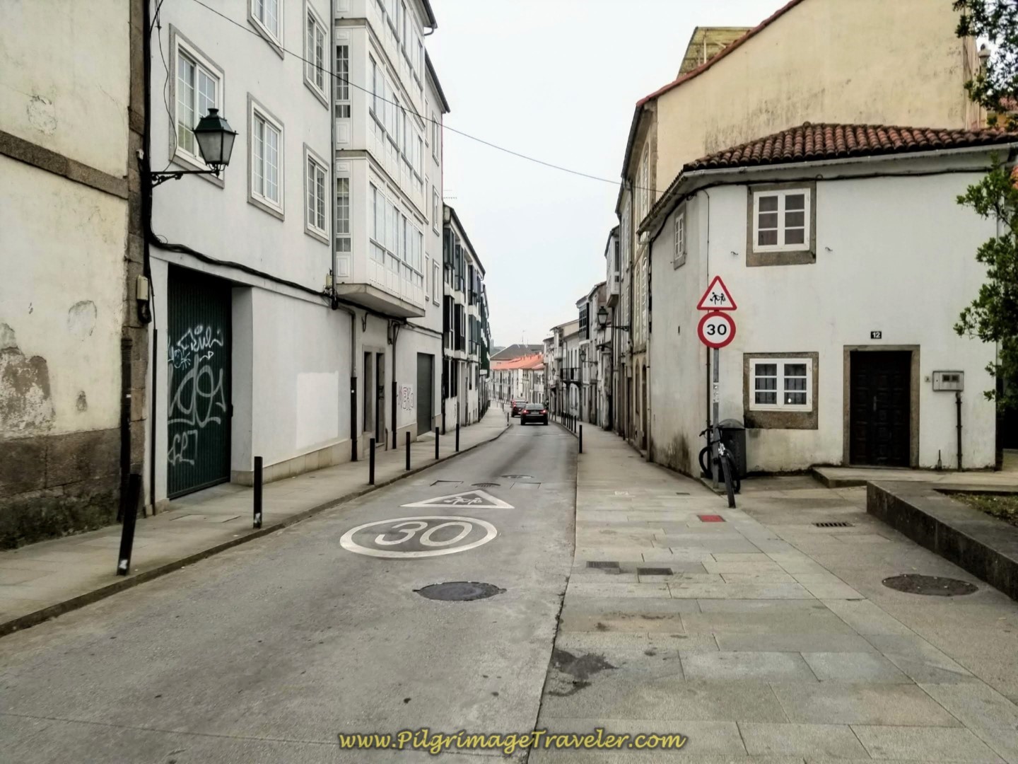 Continue on Rúa do Cruceiro do Gaio in Santiago on day one of the Camino Finisterre