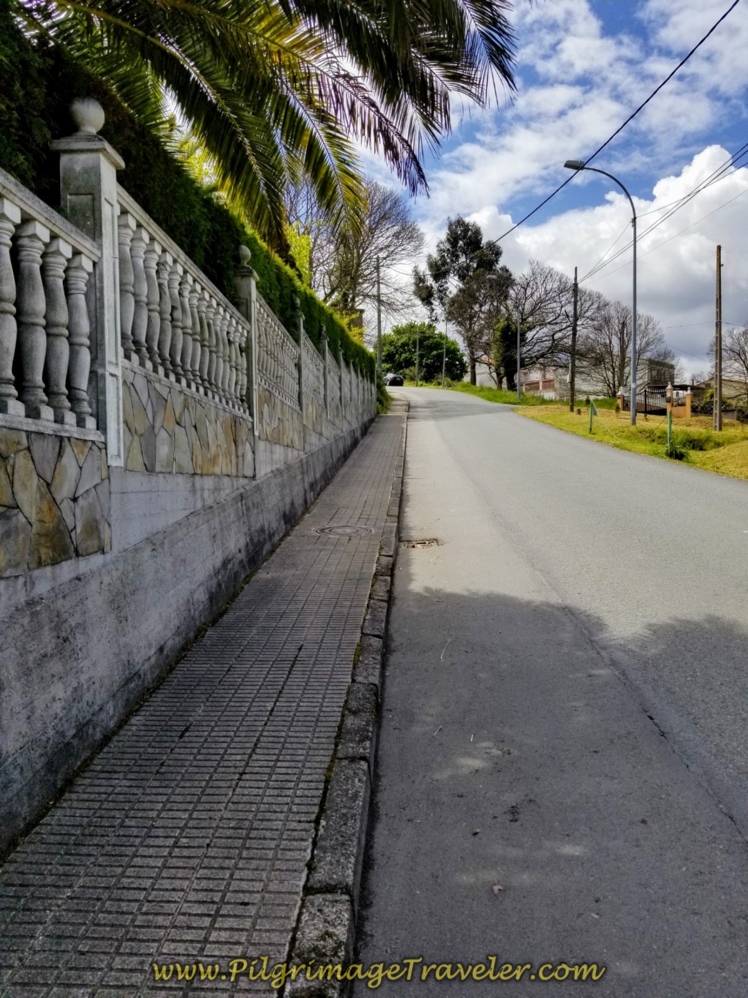 Continue Climbing on Steep Pavement on day one of the La Coruña Arm of the Camino Inglés Continue Climbing on Steep Pavement on day one of the La Coruña Arm of the Camino Inglés