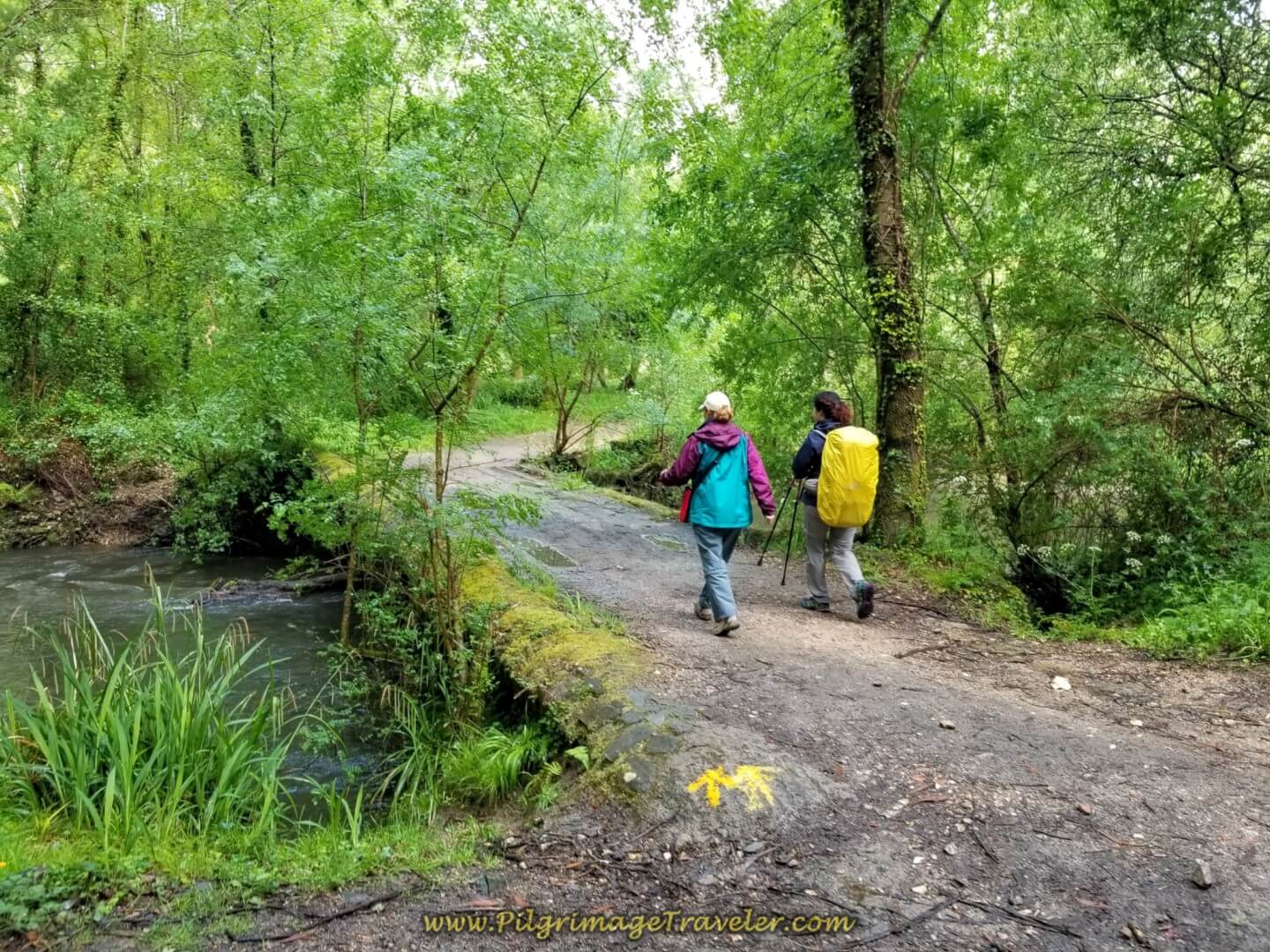 Glyvia and Miriam Cross the Puente de Baranco on day twenty on the central route of the Portuguese Camino