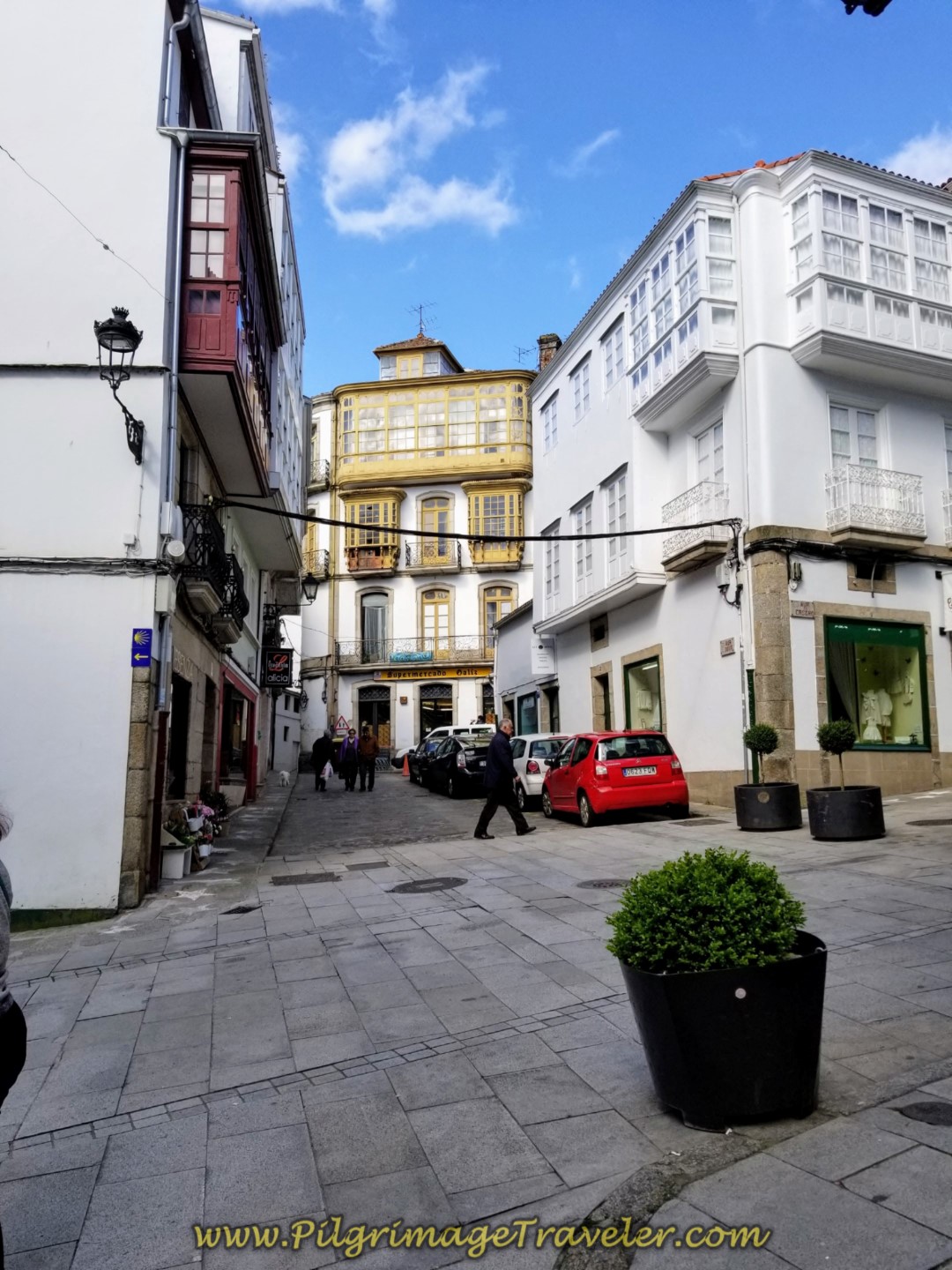 Left Turn at Lovely Shrubbery-Lined Street in Betanzos, on day four of the English Way