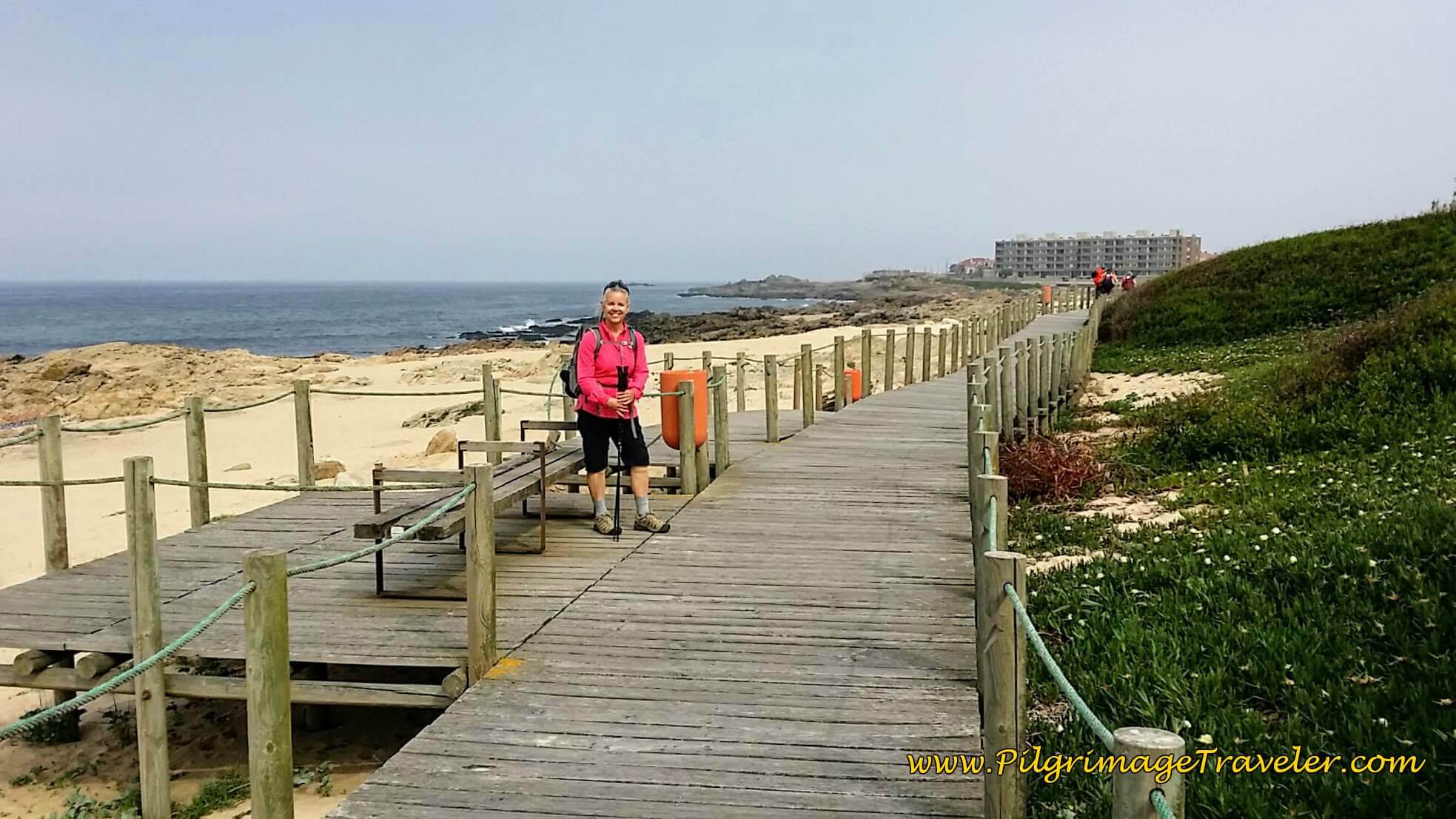 Elle on Boardwalk of Praia do Cabo do Mundo on day fifteen of the Portuguese Way on the Senda Litoral
