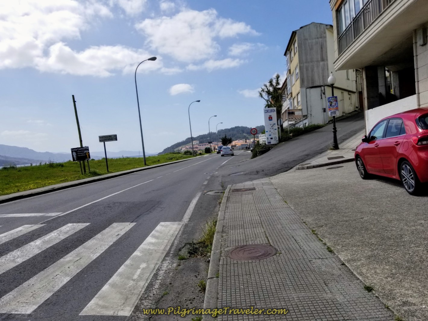 Turn Right Up Hill in Corcubión at this Intersection