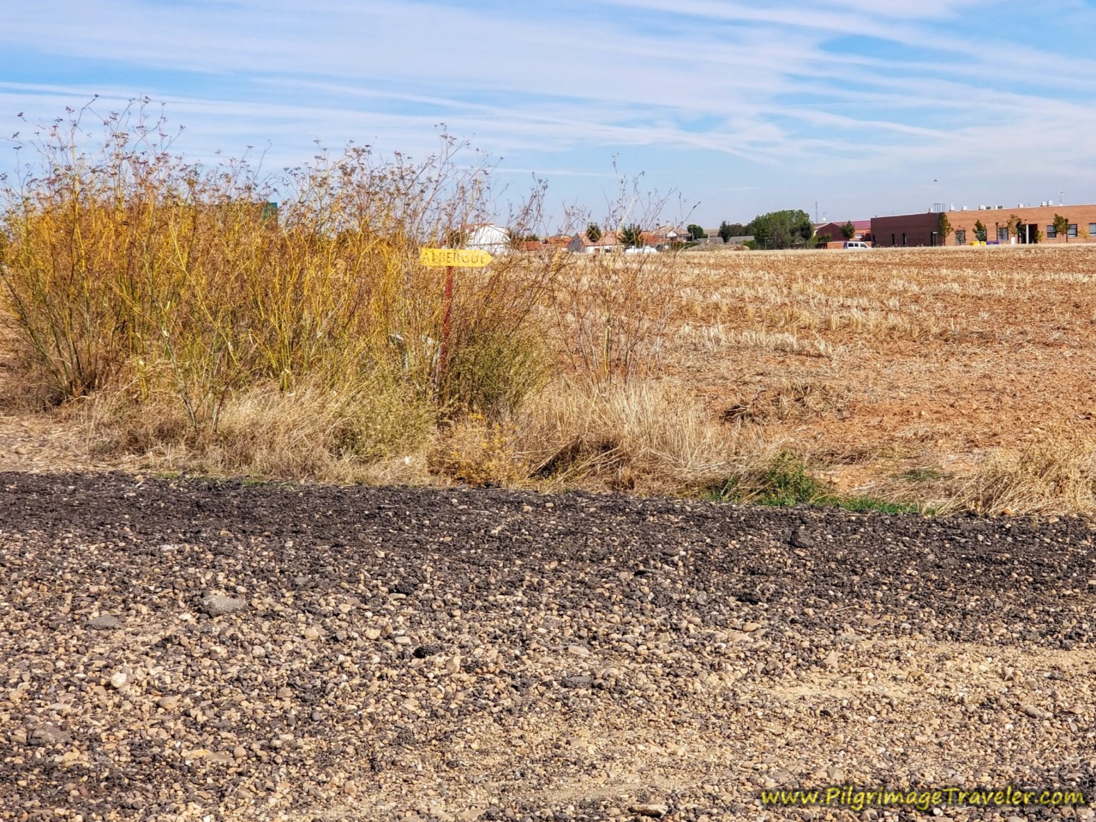 Small Yellow Sign for the Albergue on the Vía de la Plata from Zamora to Montamarta