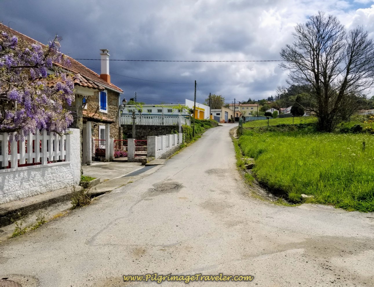 Toward the Next Town of Sigrás de Abaixo on day one of the La Coruña Arm of the Camino Inglés Toward the Next Town of Sigrás de Abaixo on day one of the La Coruña Arm of the Camino Inglés