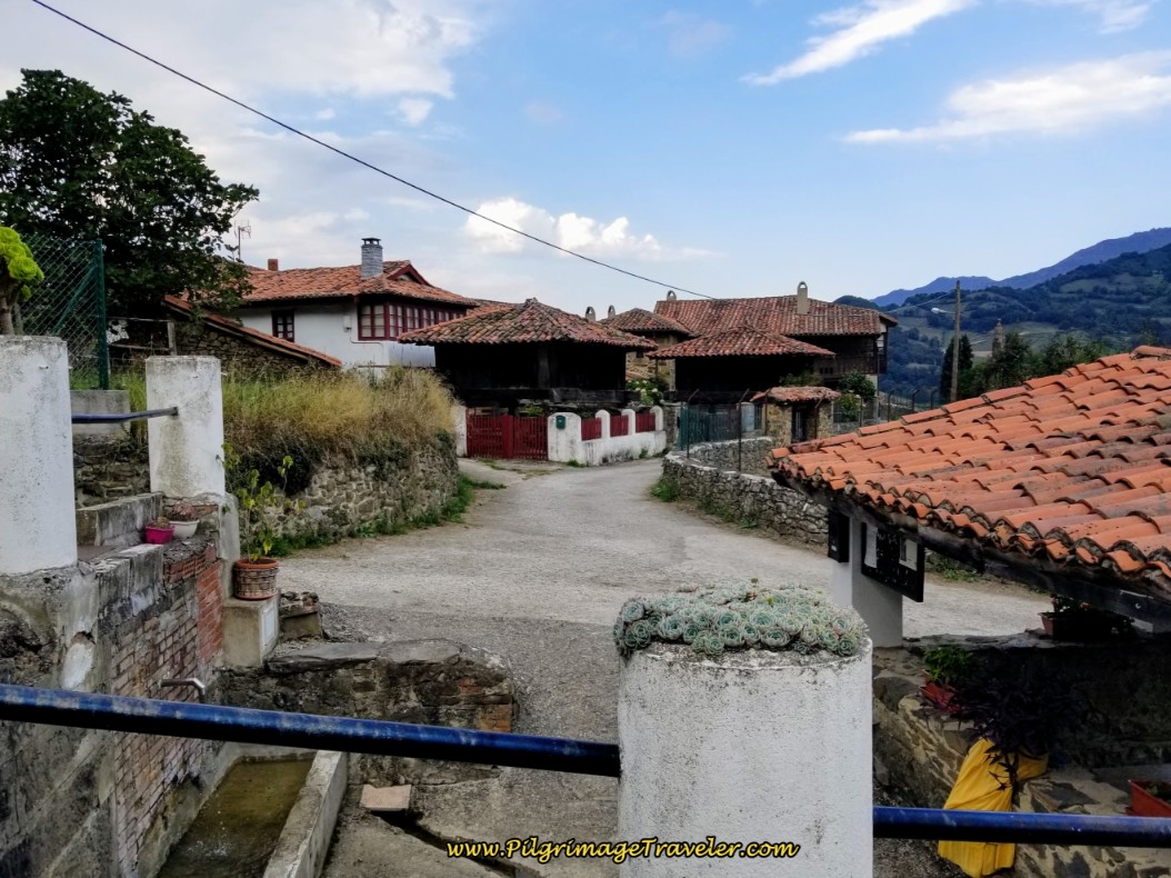 Herías Town Fountain and Square with Asturian Hórreos
