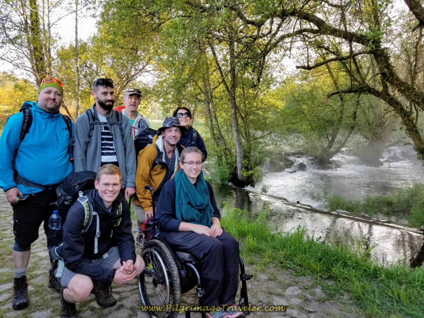 The Team at a Waterfall on the Rio Coura on day nineteen on the Central Route of the Portuguese Camino