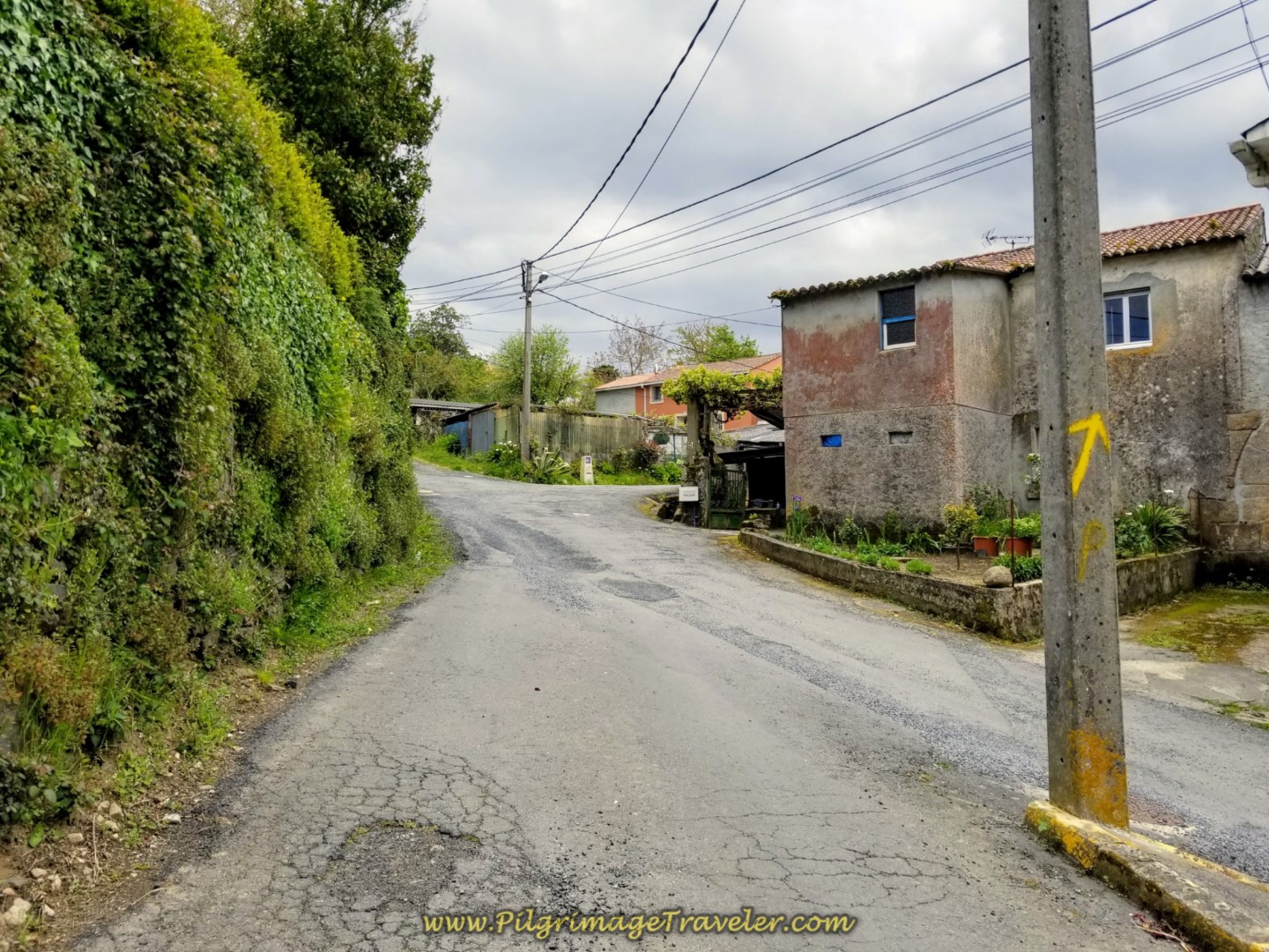 Right Turn at One of a Few Yellow Arrows on day one of the La Coruña Arm of the Camino Inglés Right Turn at One of a Few Yellow Arrows on day one of the La Coruña Arm of the Camino Inglés
