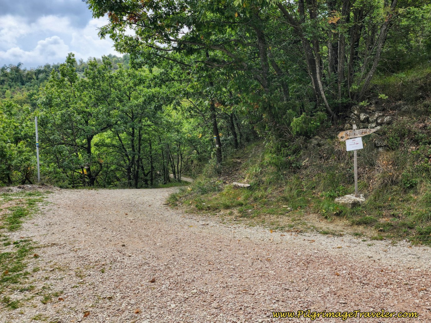 Turn Left at Gravel Road, with Signs to Bellugello