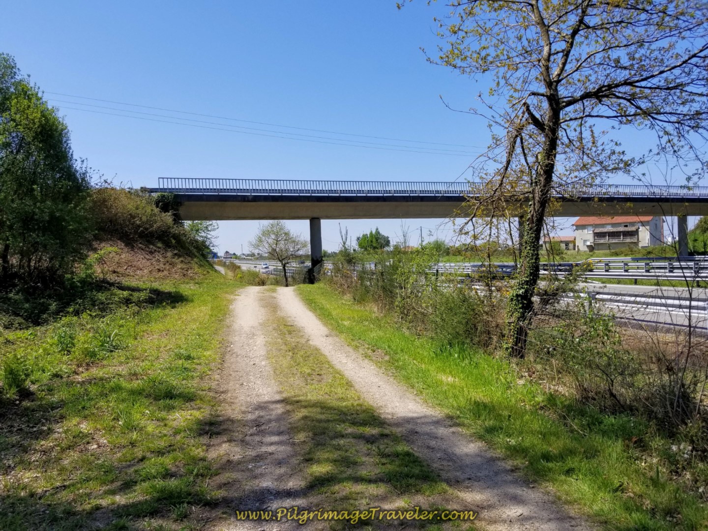 Continue on E-1 Frontage Lane Under Bridge on day seven of the English Way
