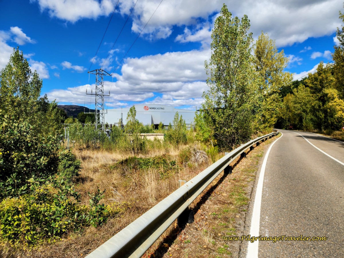 Approaching the White Industrial Building of Endaki Tecnocast