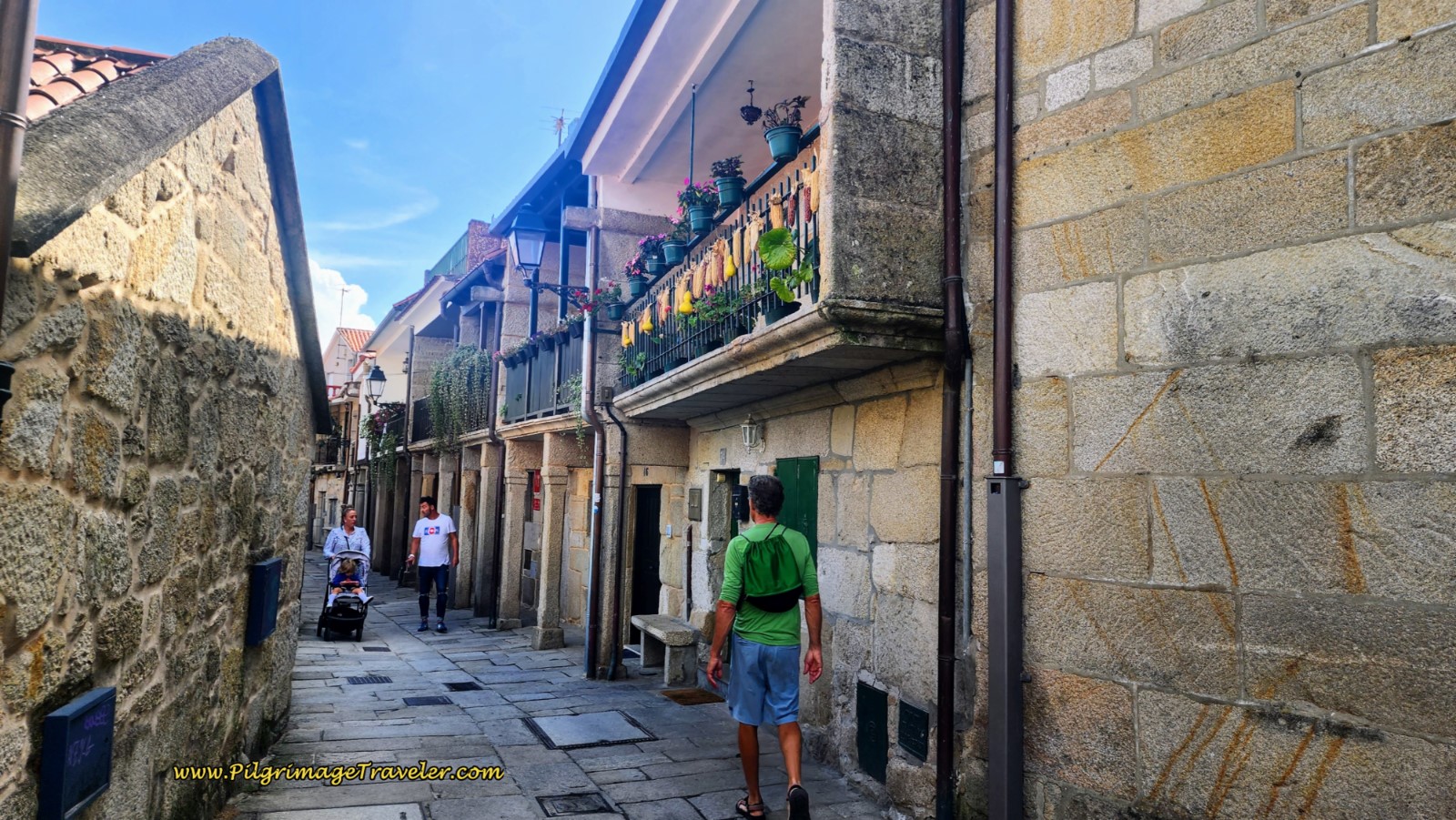 Rich Walking Along A Rúa