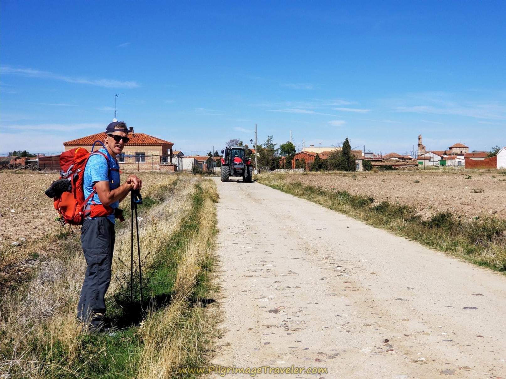 Tractor Arriving in Town Tractor Arriving in Town
