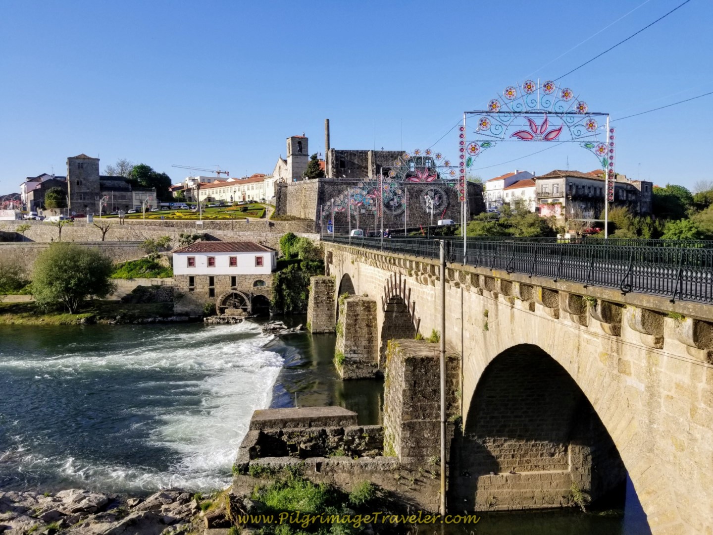 Crossing the Cádavo River on the 14th Century Medieval Bridge into Barcelos, connecting it with Barcelinhos to the south