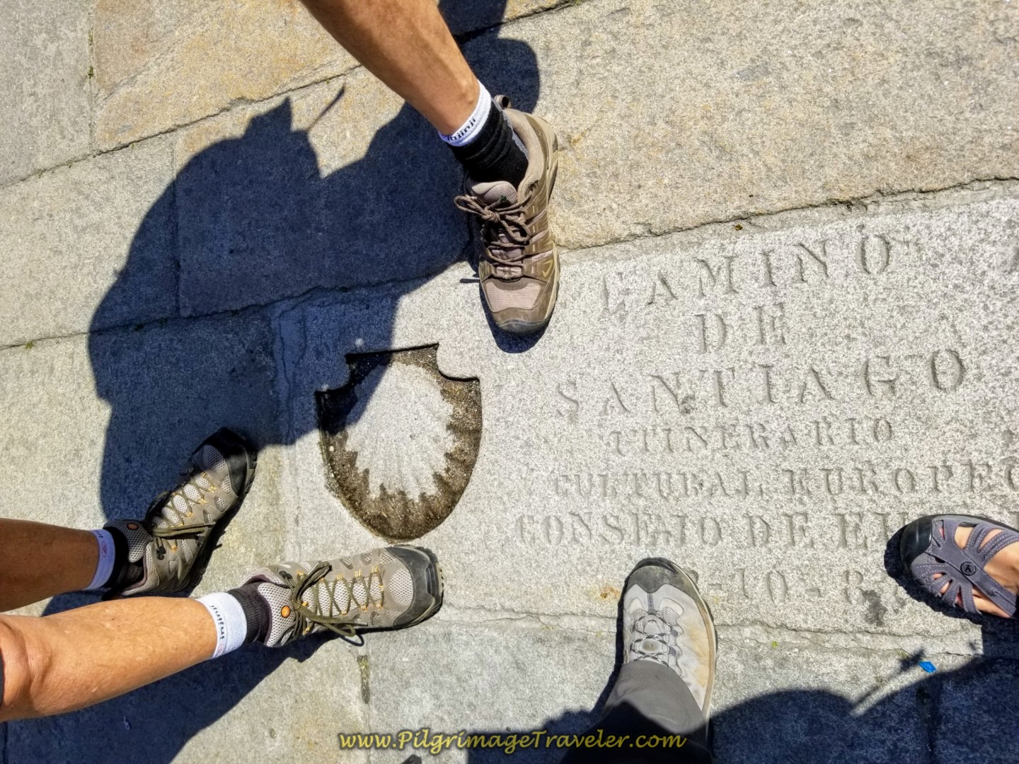 Stepping on the Final Waymark in the Praza do Obradoiro on day eight of the English Way