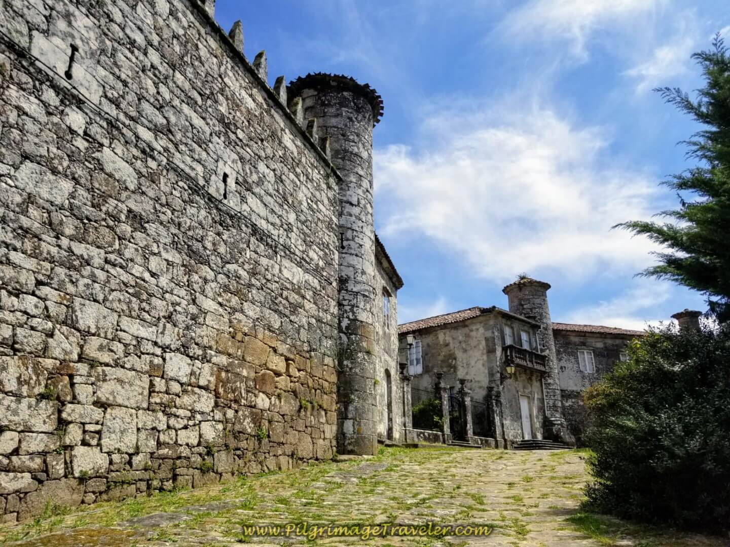 Castle walls of the Pazo do Cotón in Negreira on day one of the Finisterre Way.