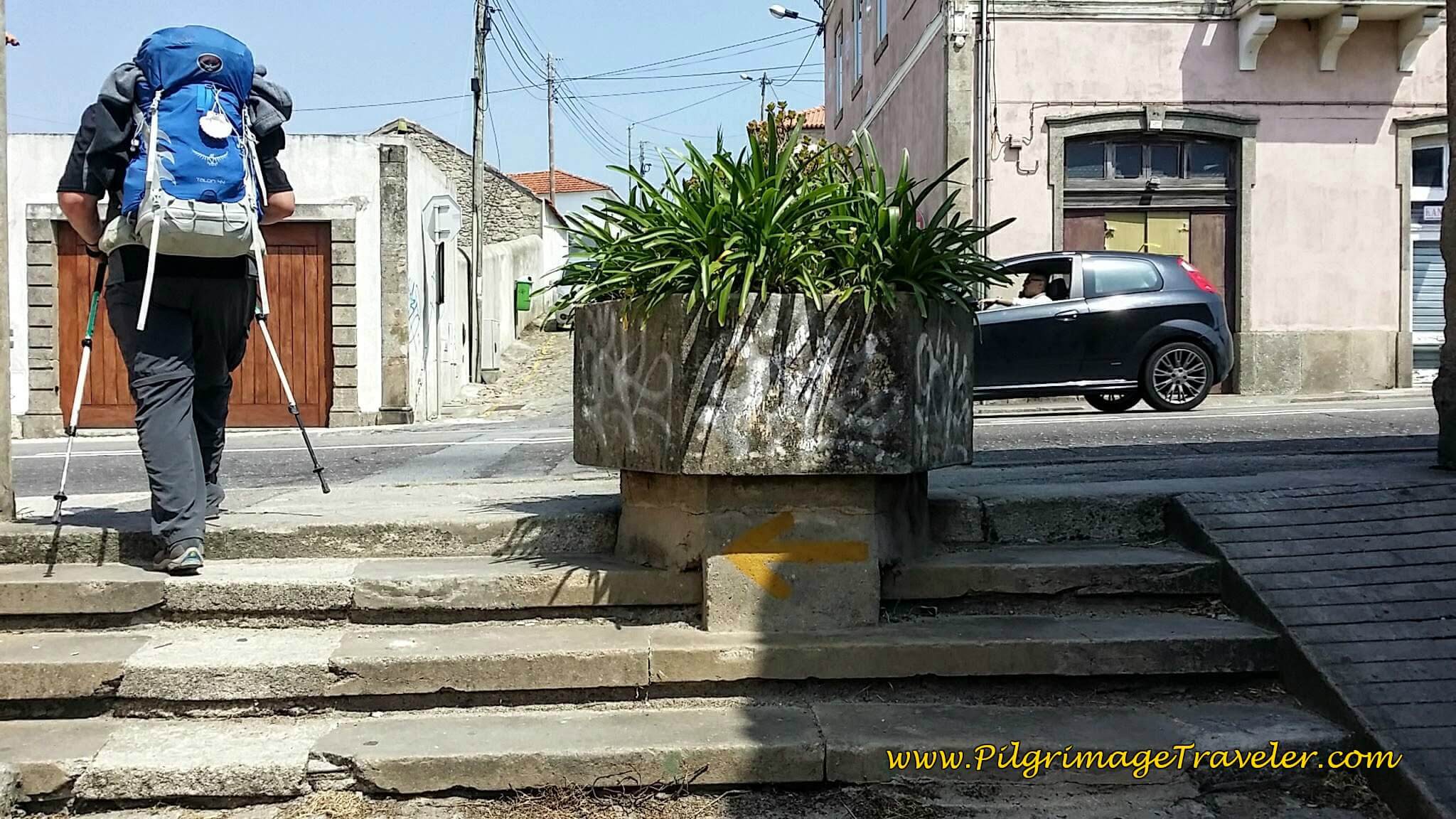 Turn Left at Top of Stairs Onto N13 into Vila do Conde on day fifteen of the Camino Portugués on the Senda Litoral