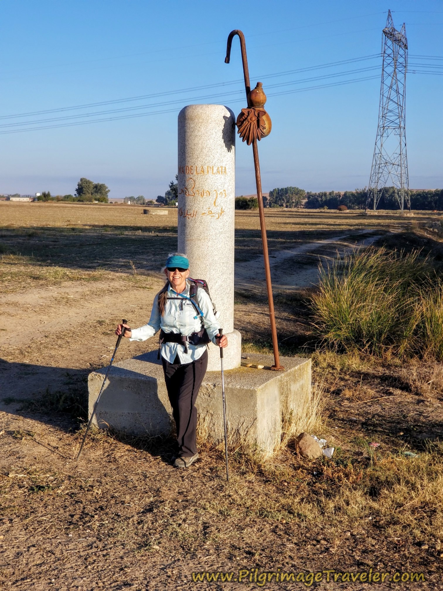 Elle at waymark with the pilgrim's staff and gourd, on the Vía de la Plata from Villanueva de Campeán to Zamora