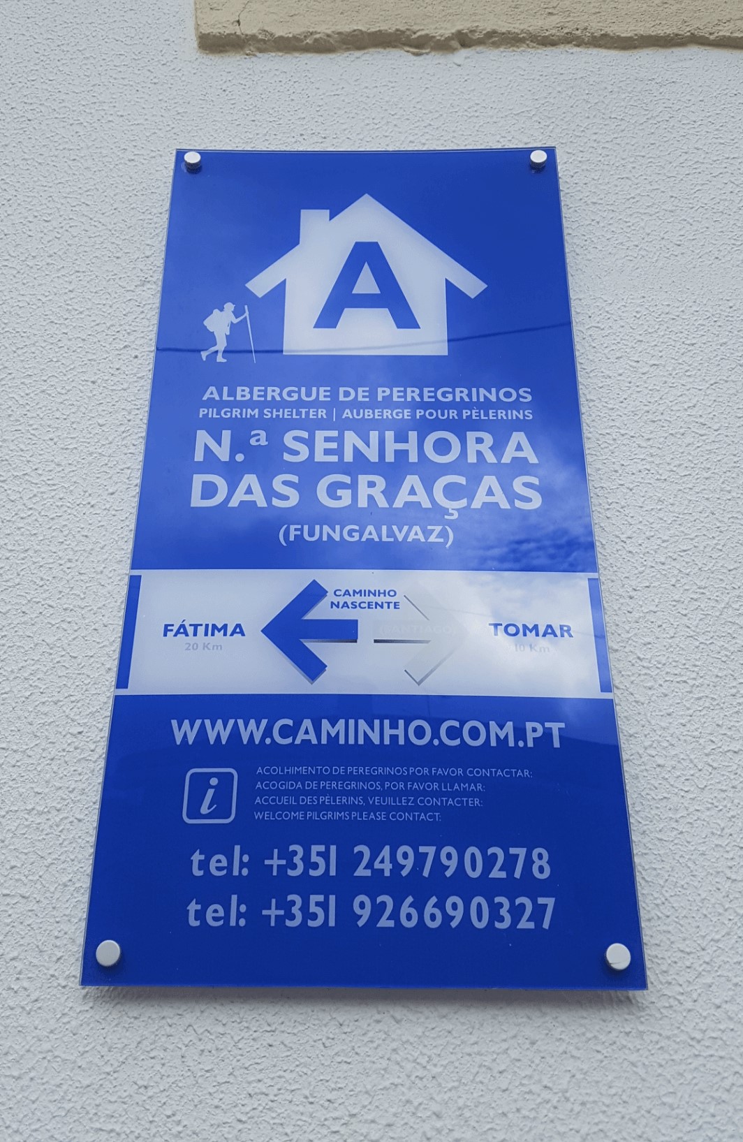 Sign for Parish Albergue on Church, Halfway on the Caminho Nascente